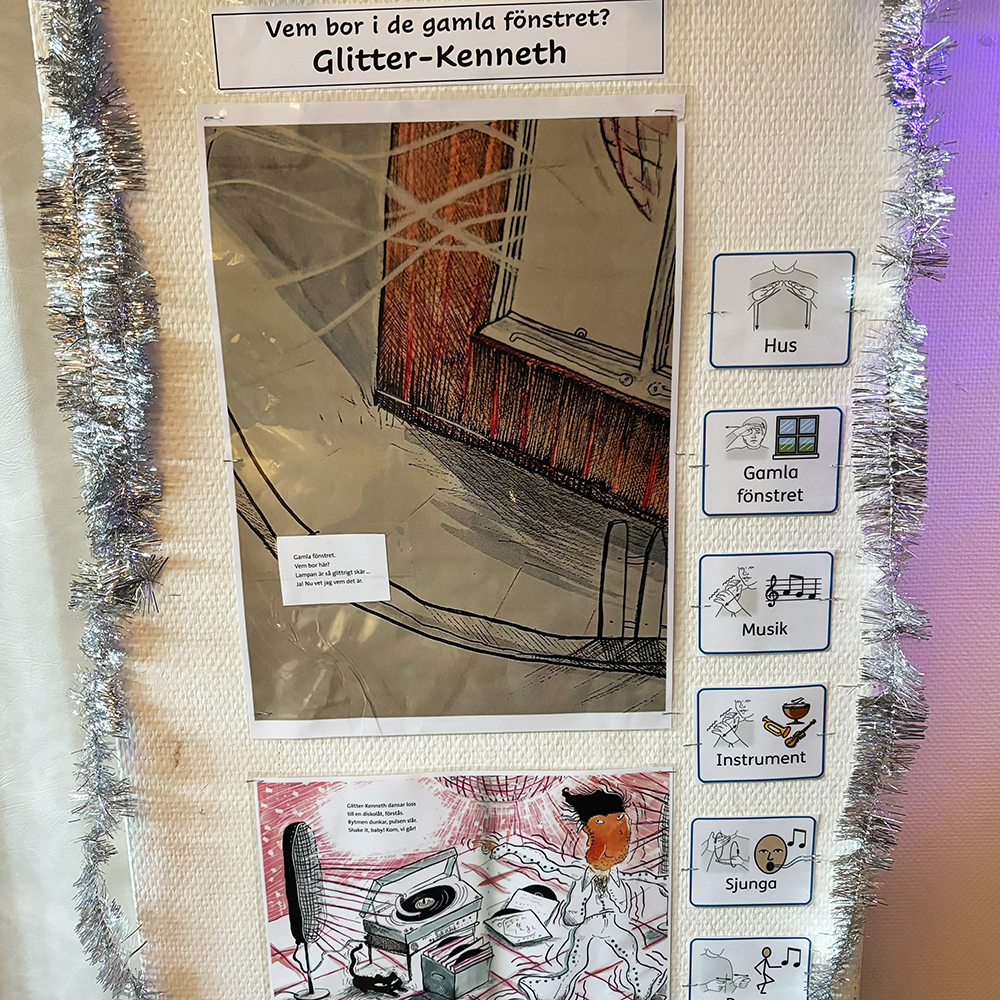 Bildstöd på en vägg som beskriver en bild om Glitter-Kenneth